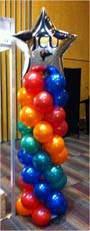 Balloon column with foil shape topper